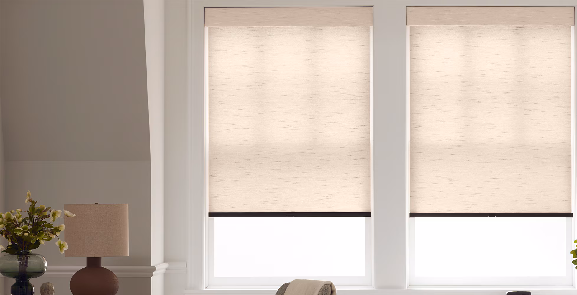 Elegant bedroom with modern roller shades